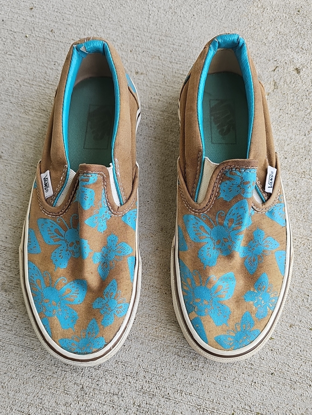 Vans Slip-On Sneakers in Turquoise Floral on Tan Canvas